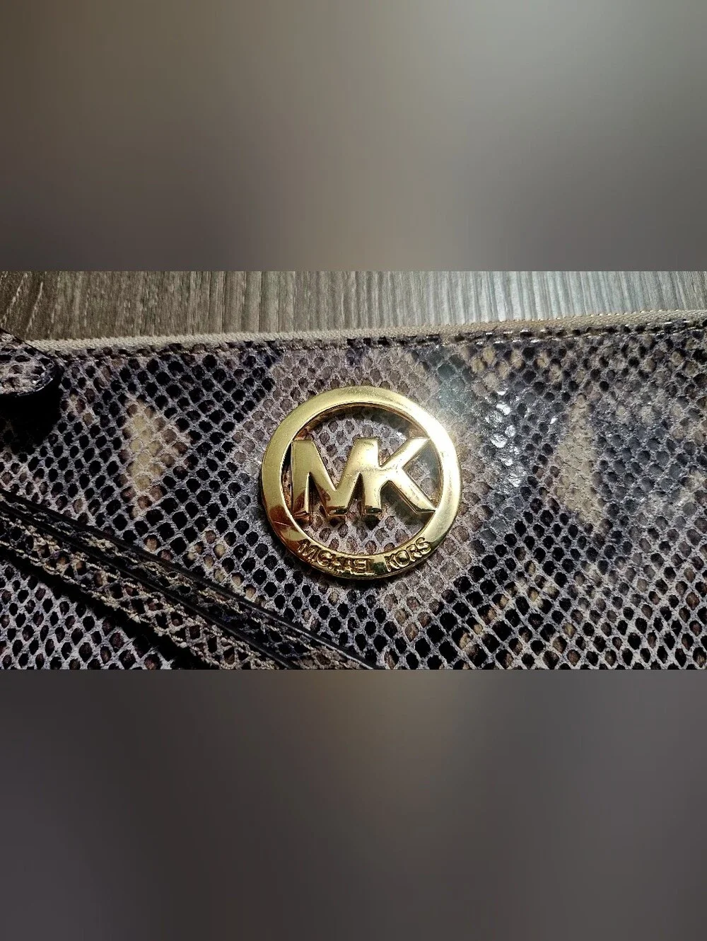 Authentic Michael Kors Snakeskin Large Wristlet Wallet with gold logo